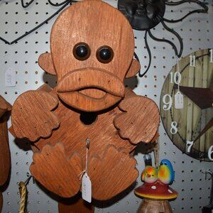 amish made monkey birdhouse 19 inches long   11 inches wide   8 inch deep